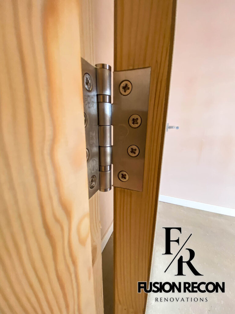 Interior door renovation with bespoke timber frame and high-quality finish – Battersea SW11