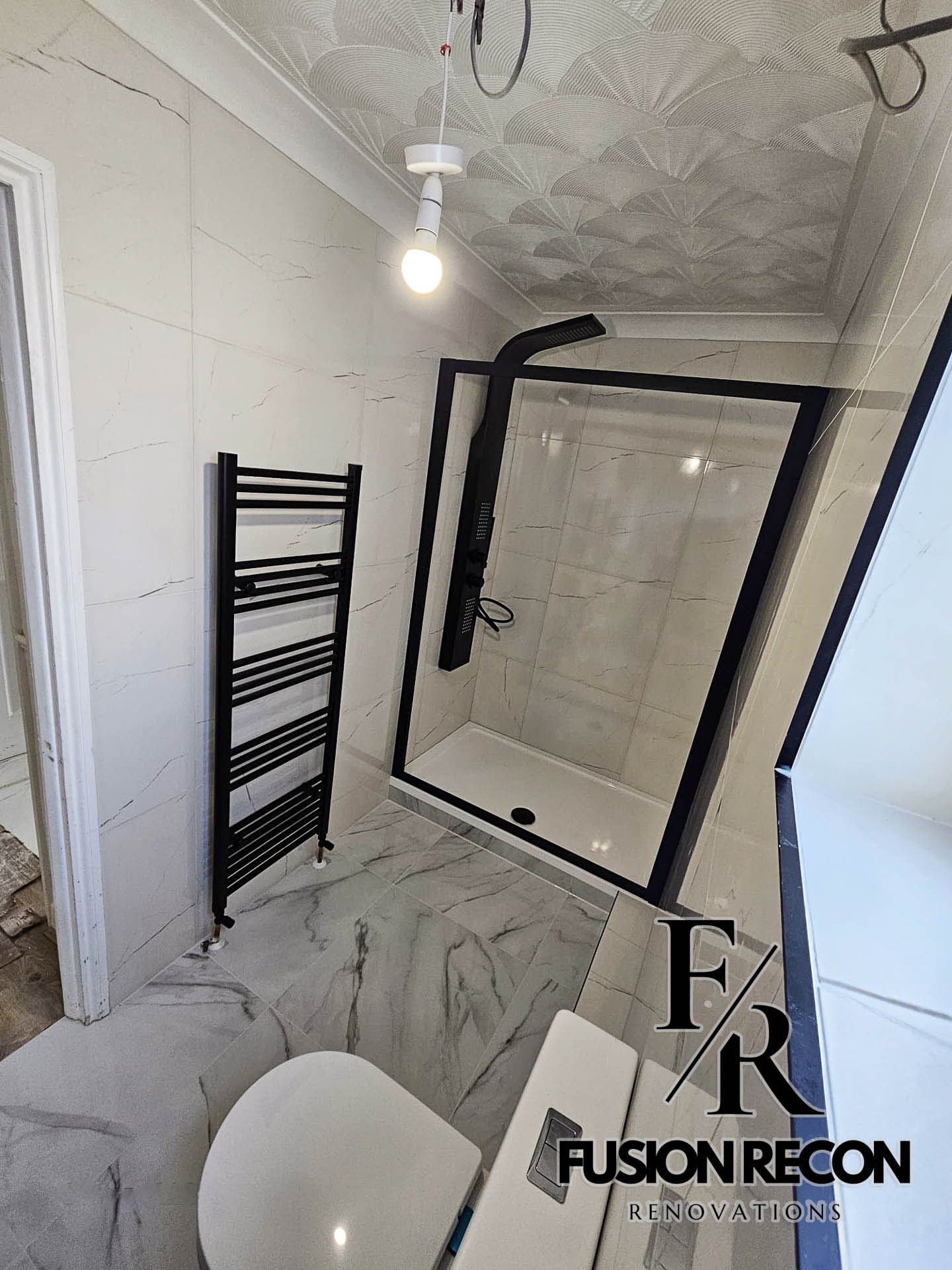 Bathroom renovation with grey marble-effect tiles and walk-in shower – Richmond TW9