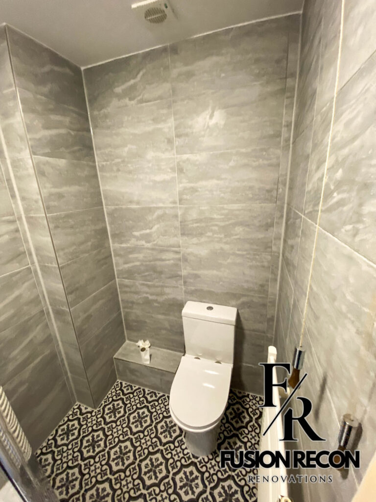 Bathroom renovation with Victorian-style patterned floor tiles – Dulwich SE21