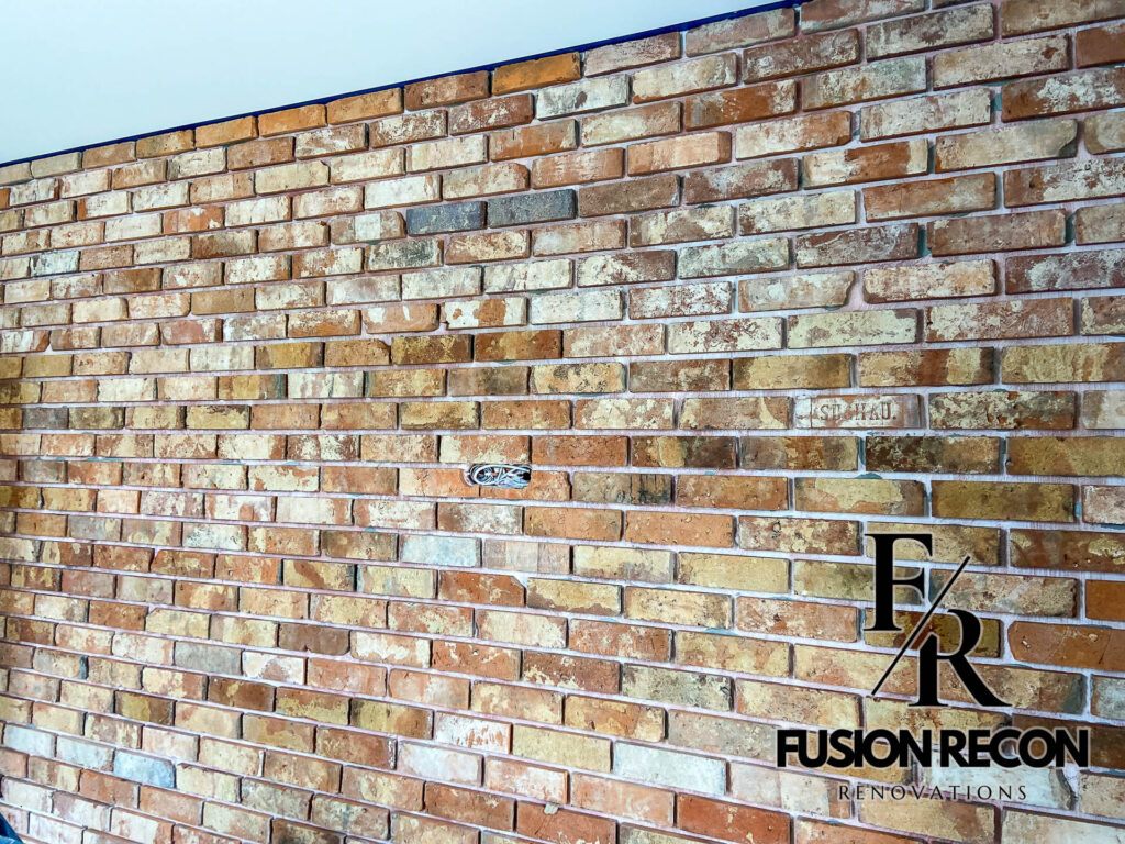 Brick-style wall tile installation in a Richmond TW10 home renovation