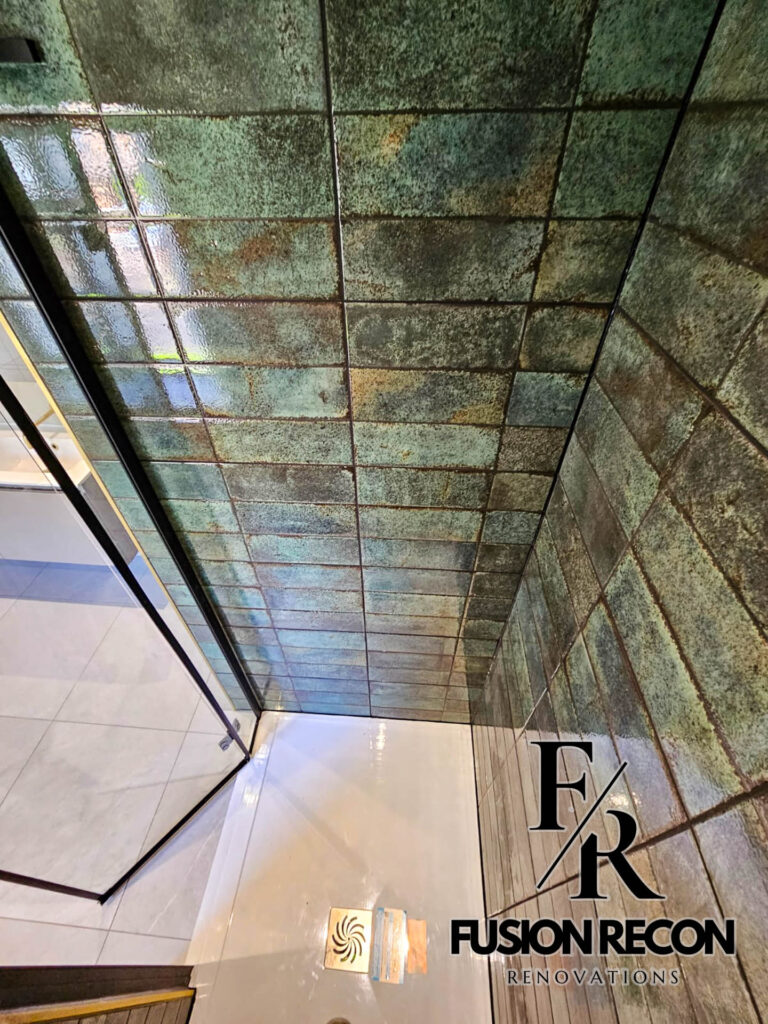 Modern bathroom renovation with marble-effect tiles and sleek fixtures – Chelsea SW3