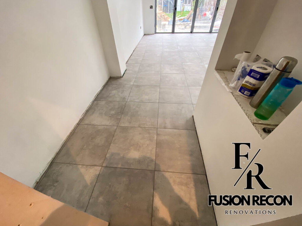 Large-format floor tiles installed on the ground floor – Clapham SW4