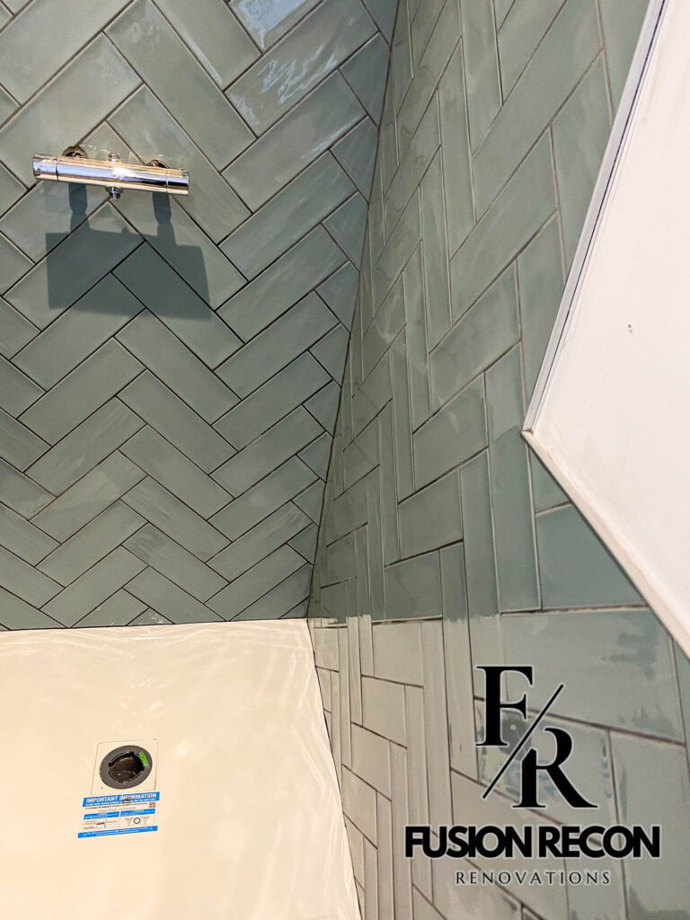 Modern small bathroom with wood-effect flooring and sleek fixtures – Fulham SW6
