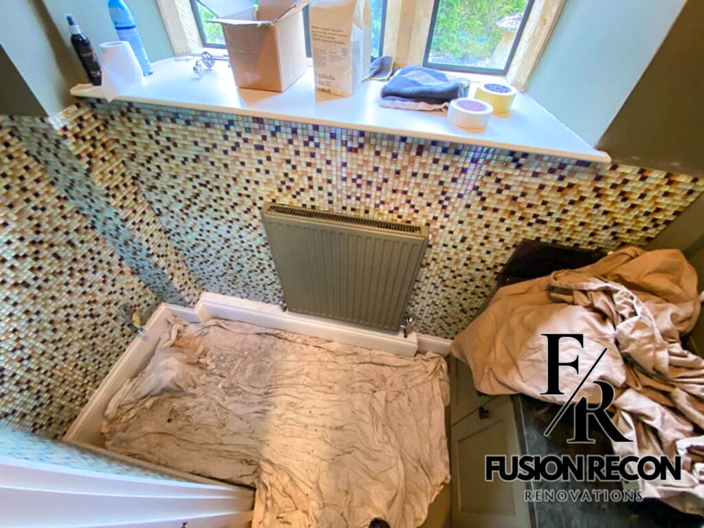 Mosaic tile design in a compact toilet space – Richmond TW10