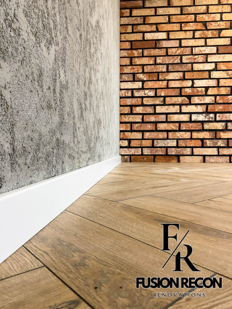 Rustic brick slip feature wall in a Richmond TW10 living room renovation