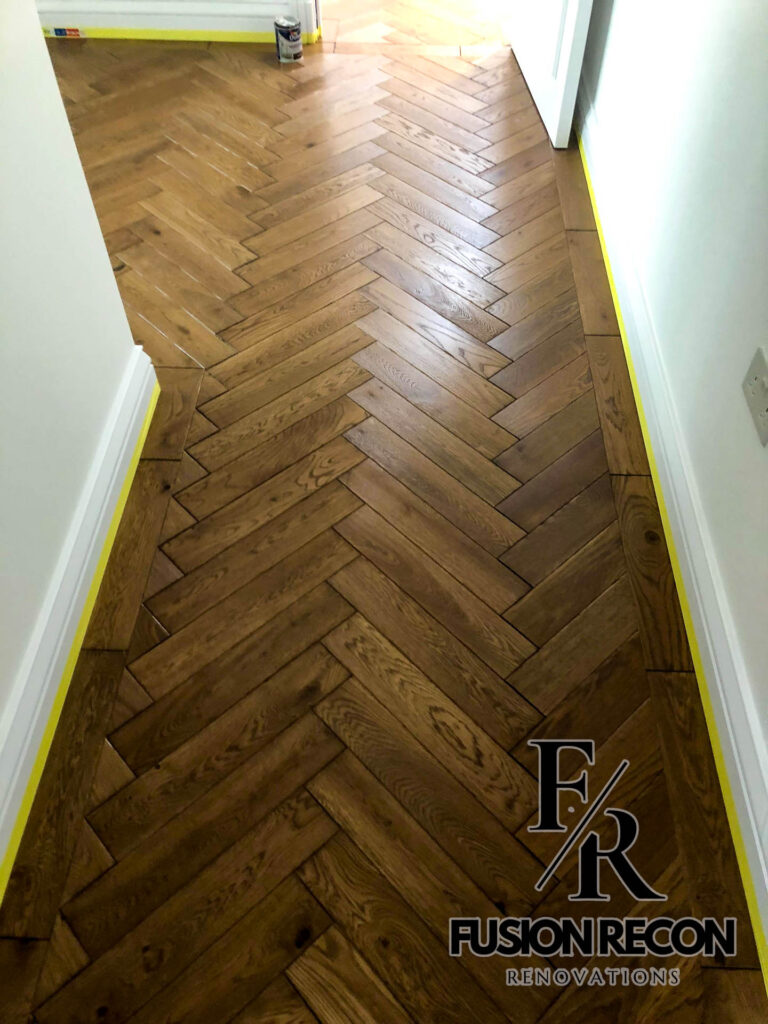 Solid wood herringbone flooring with premium oak finish – Clapham SW4