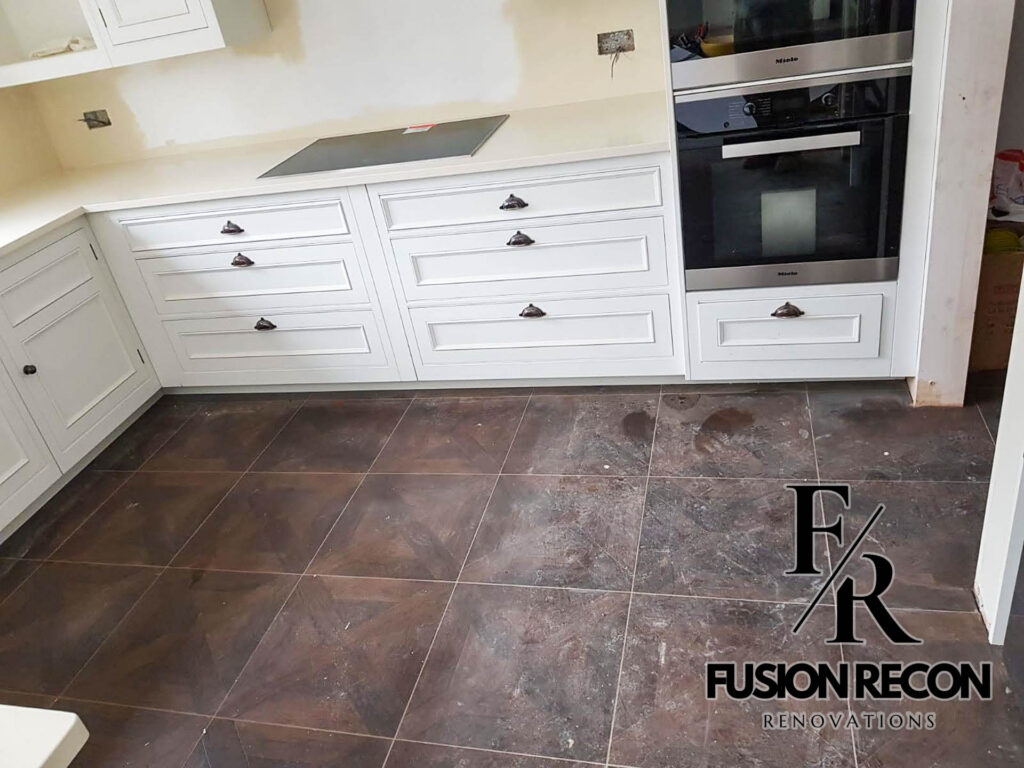 Traditional kitchen storage design with bespoke C-shaped layout – Putney SW15